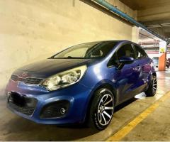 VENDO KIA RIO 5 AÑO 2012.